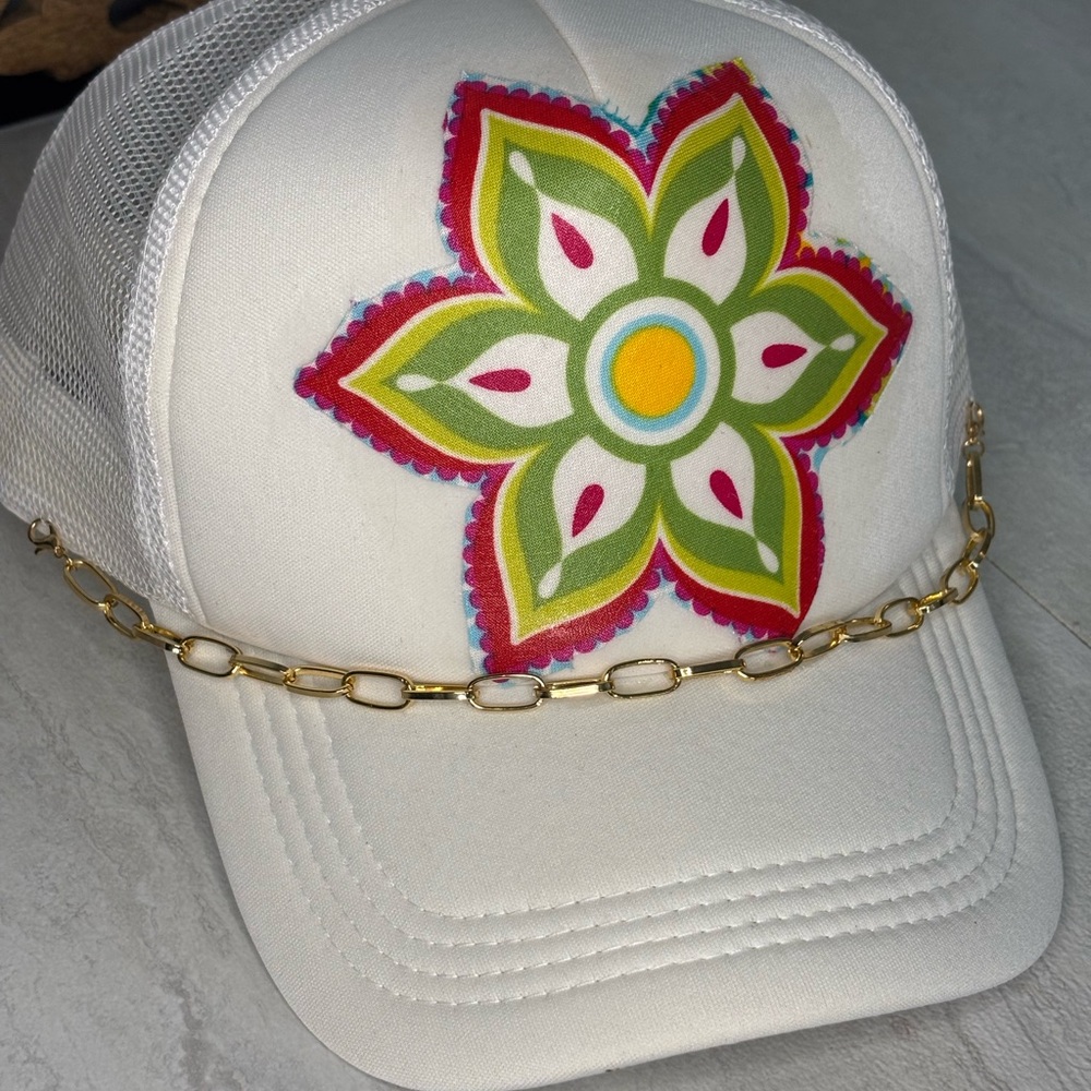 Chic White Cap with Floral Design and Gold Chain